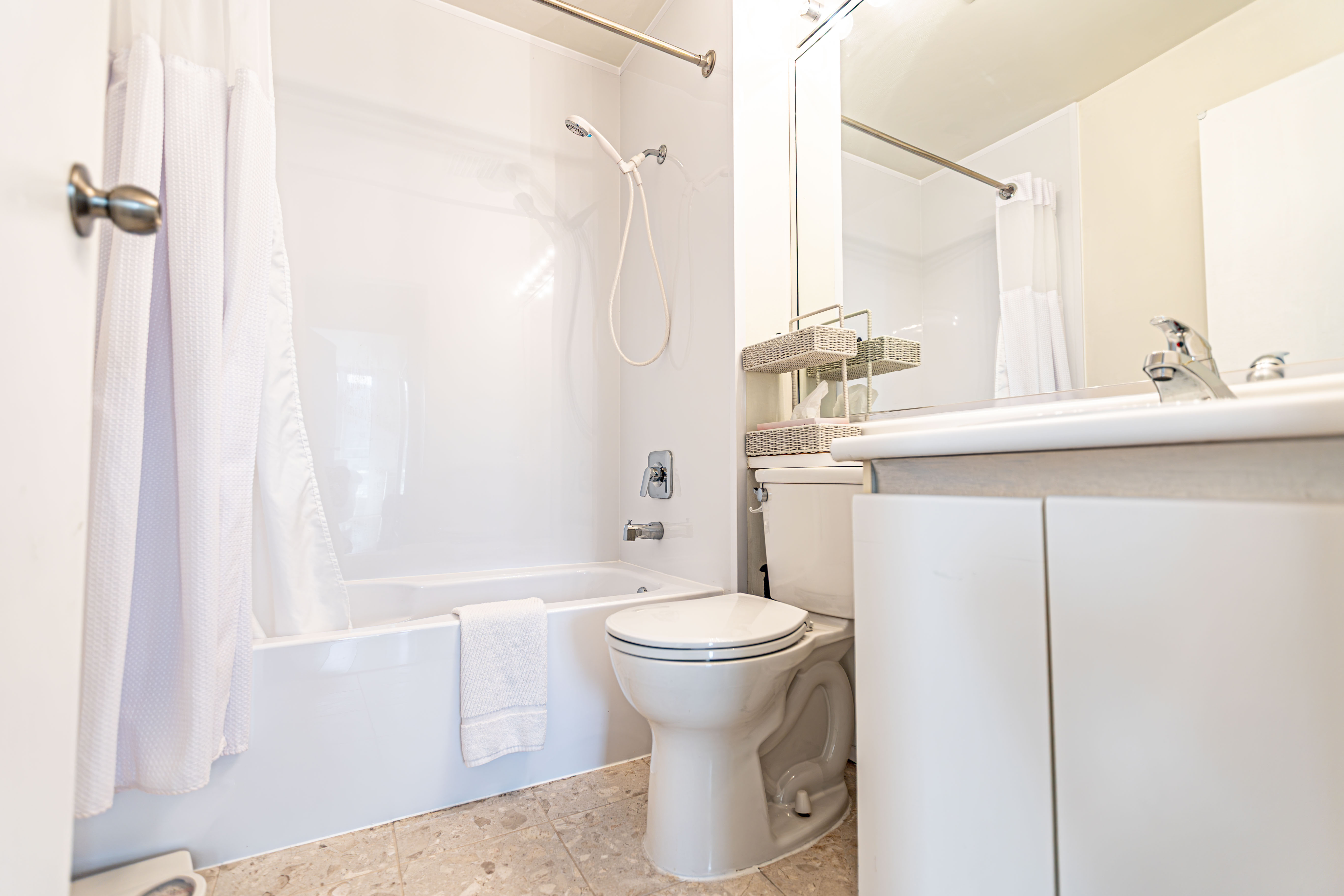 Bathroom with a bathtub and shower